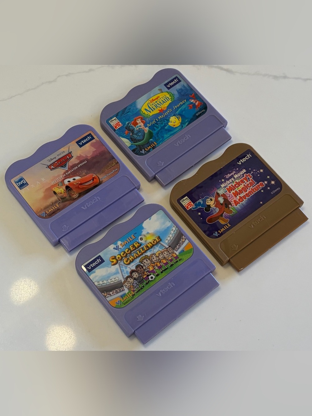 Bundle of VTech V.Smile Games: Cars, Mickey Mouse, Mermaid and Soccer Challenge